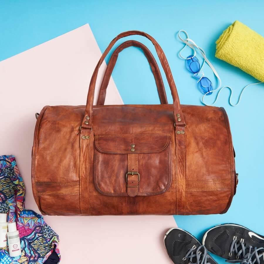 IndiFash - 24 Inch Handcrafted 26″ Curved Duffle goat Leather Bag | 100 Genuine Leather thumbnail 5