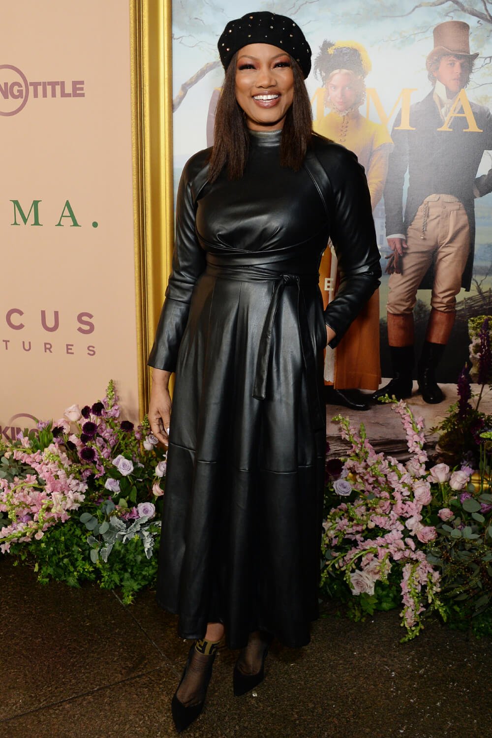 Garcelle Beauvais at Focus Features EMMA premiere - Leather Dress