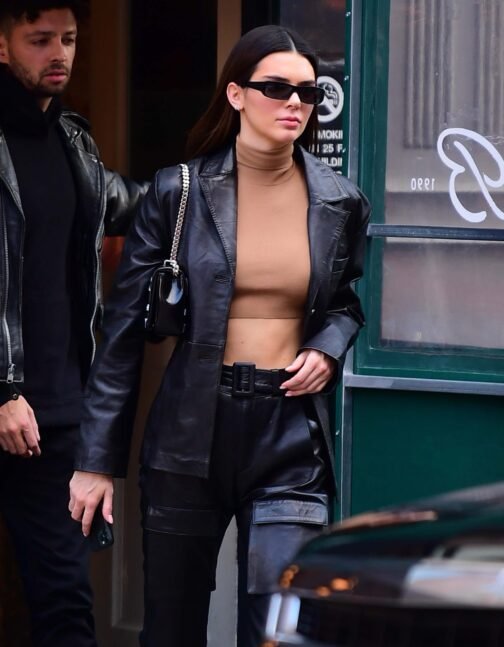 Kendall Jenner flashes her toned abs - Leather Jacket